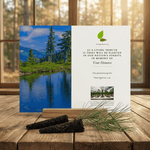 Memorial tree card with nature scene of Washington National Forests and text on a wooden surface