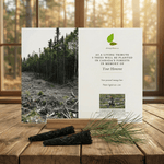 Memorial card for planting trees in Canada's forests on a wooden surface with a forest background.