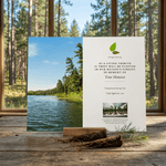 Nature-themed card with a scenic lake and forest view, placed on a wooden surface.